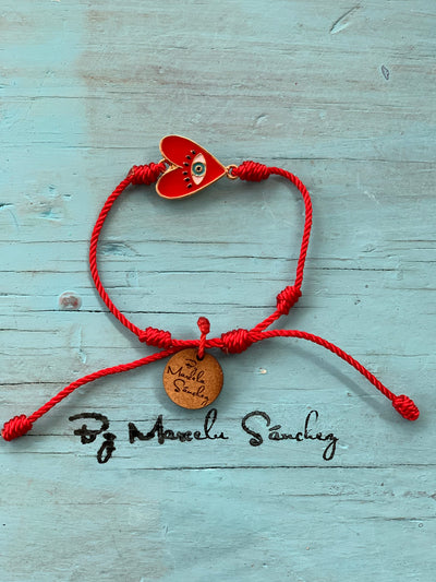 Pulsera hilo rojo siete nudos