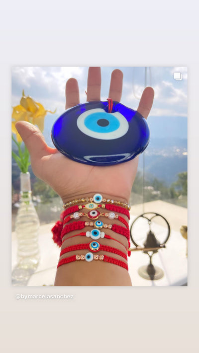 Pulsera hilo rojo siete nudos